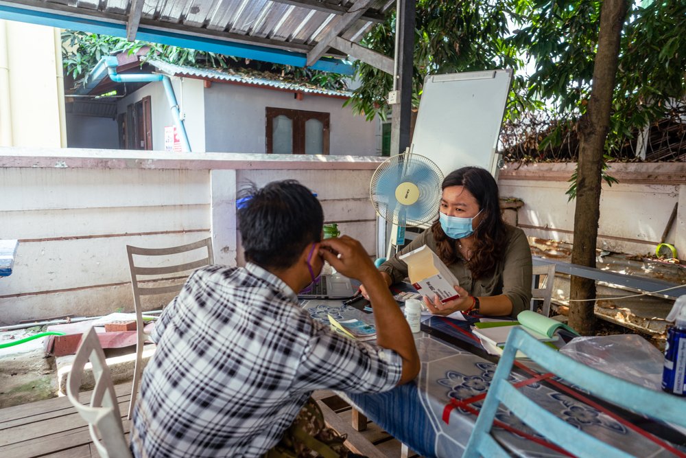 An MSF staff member prepares medication for a patient in Yangon&#039;s MSF offices.