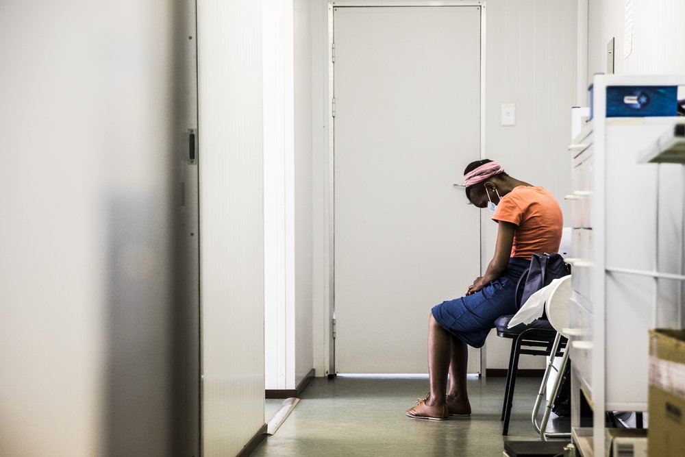 A patient at on the TB Practecal Trial patiently waits for her daily trial regimens. Previous trial in 2018.