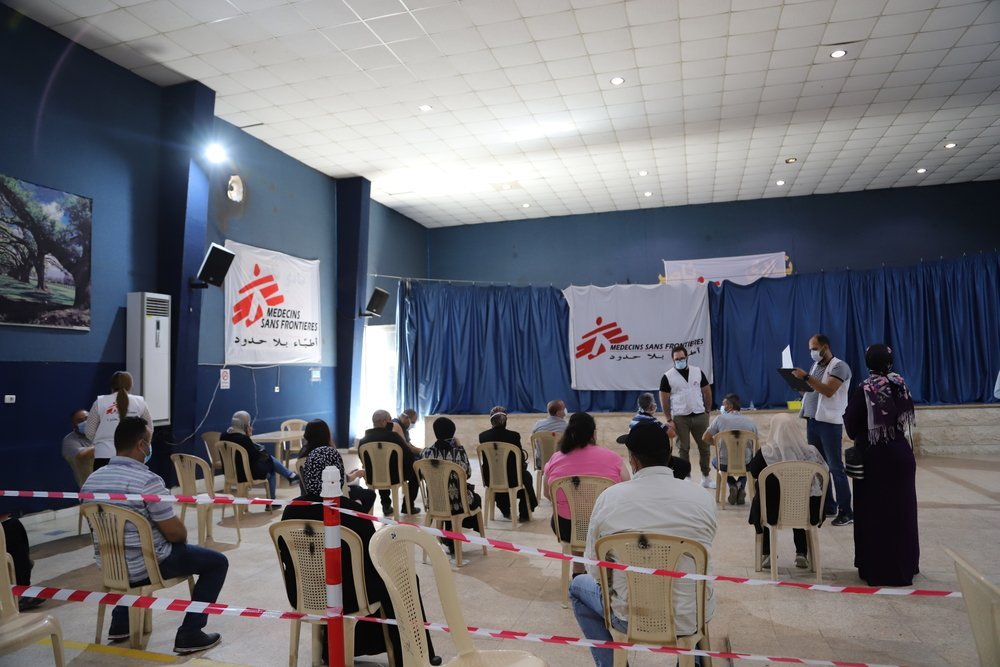People who just received a dose of COVID-19 vaccine are attending a health promotion session at the MSF vaccination center in Bar Elias (June, 2021).
