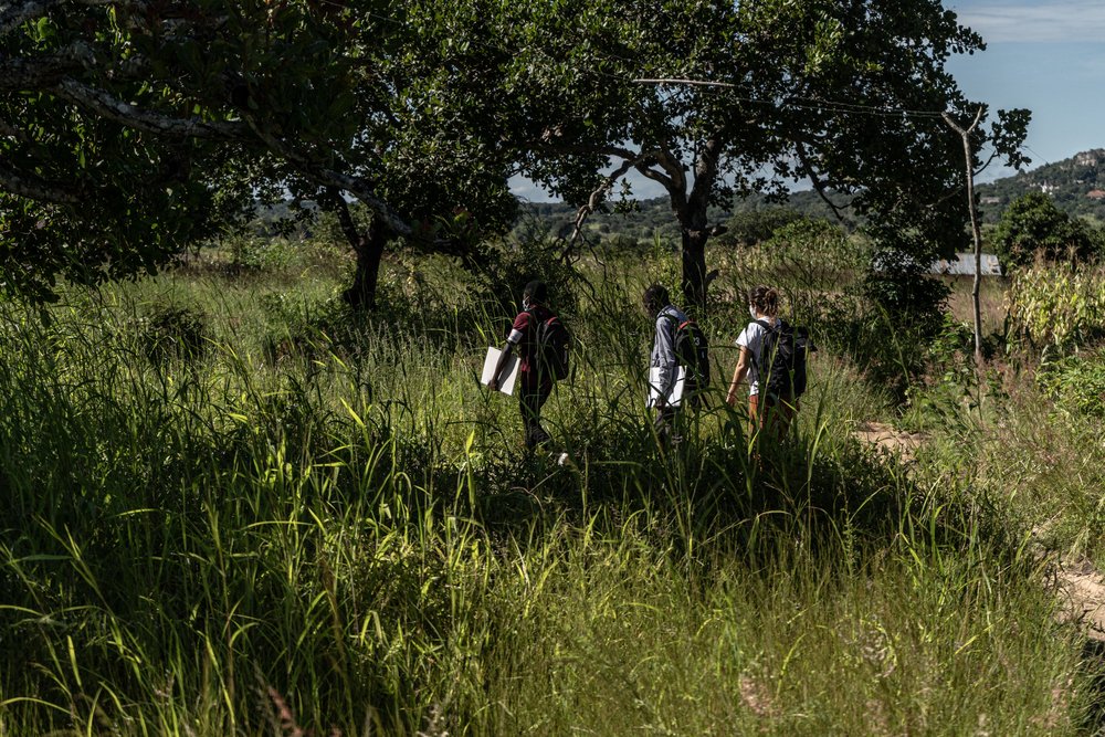 Nelson (L) and Ibrahimo (R) are part of a health and mental health promotion team working in the communities in and around Montepuez where many families that have fled the fighting in Cabo Delgado have sought shelter. 