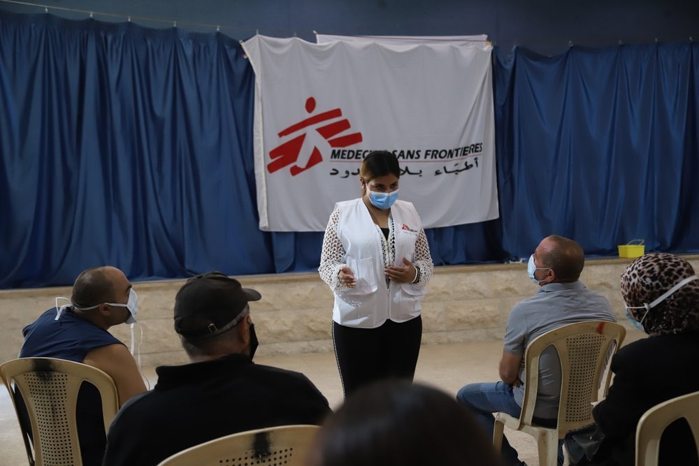 An MSF staff is providing information about COVID-19 vaccines at the MSF vaccination center in Bar Elias (Bekaa Valley). 