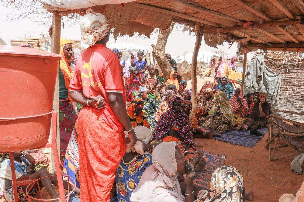 In a camp for internally displaced persons in the city of Gorom-Gorom, in the Sahel region of Burkina Faso, women gather to meet with MSF health promotion teams to discuss issues of access to healthcare. (March, 2022).