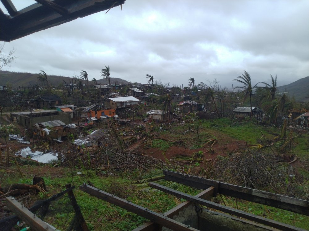 Dinagat Islands: Trees and houses alike fell to the strong winds and rain brought by Typhoon Rai. (January, 2022).