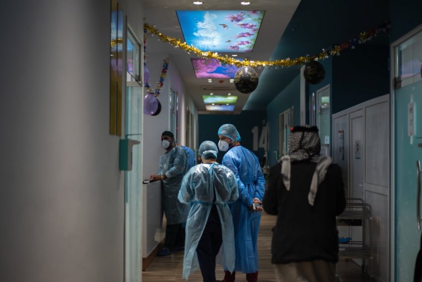 MSF nurses wearing personal protective equipment and touring on patients at the MSF run inpatient ward of the Al-Shifaa 13 COVID-19 ward in Al-Kindi Hospital, Baghdad.