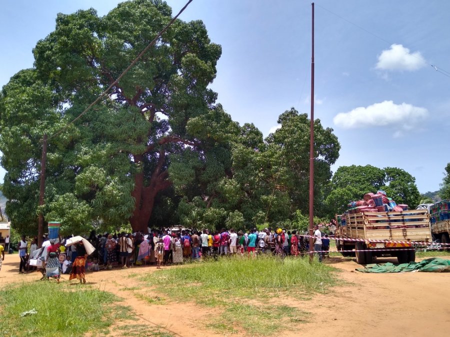 Displaced people wait for a distribution of essential relief items by MSF in Meluco, in the northern Mozambican province of Cabo Delgado, 19 February 2021.
